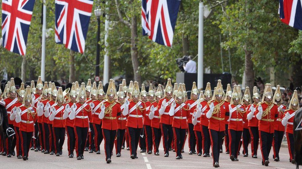 Royal guards march on the day of the procession of the coffin of Britain's Queen Elizabeth