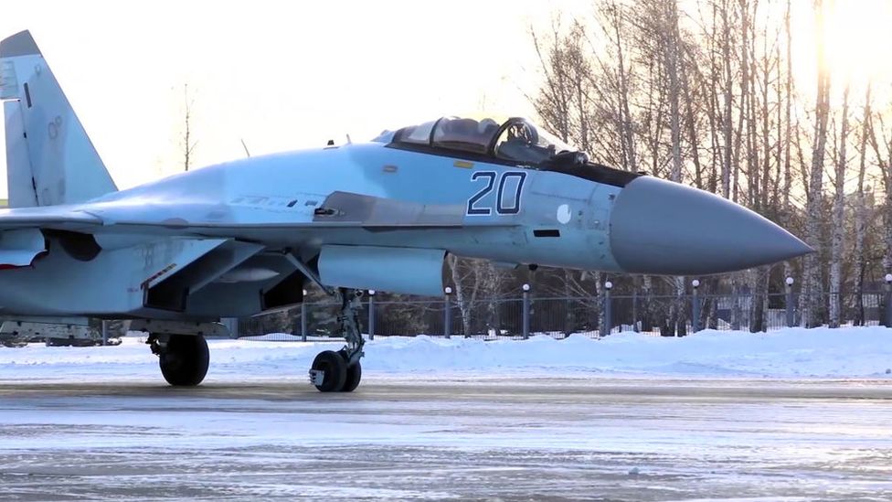 ​​Caption: Su-35 warplane prepares to take off for joint military exercises with Belarus