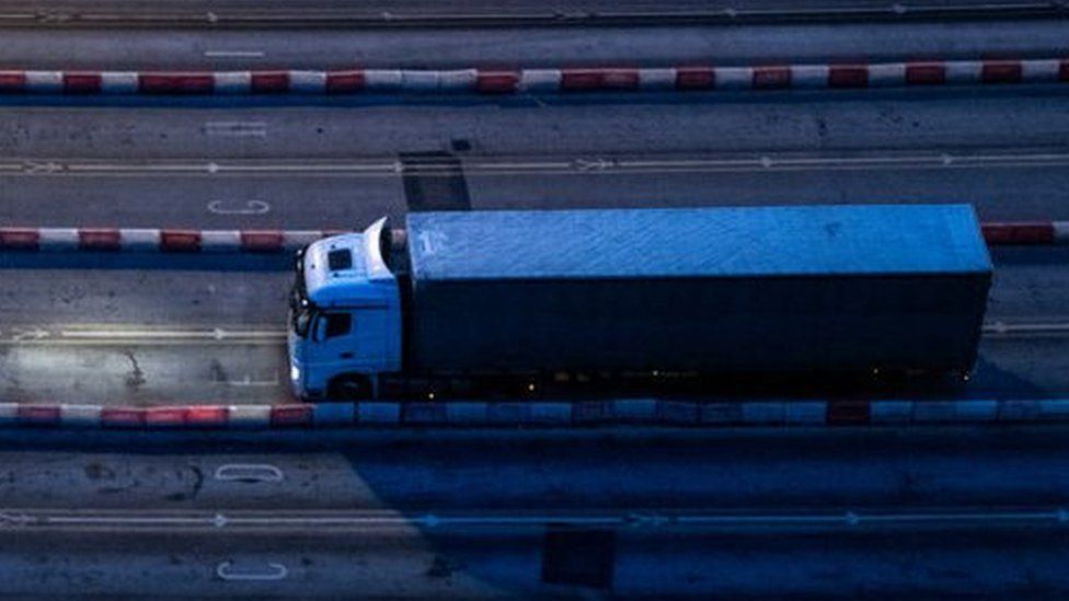 A lorry driver arrives at Dover early in the morning on 1 January 2021
