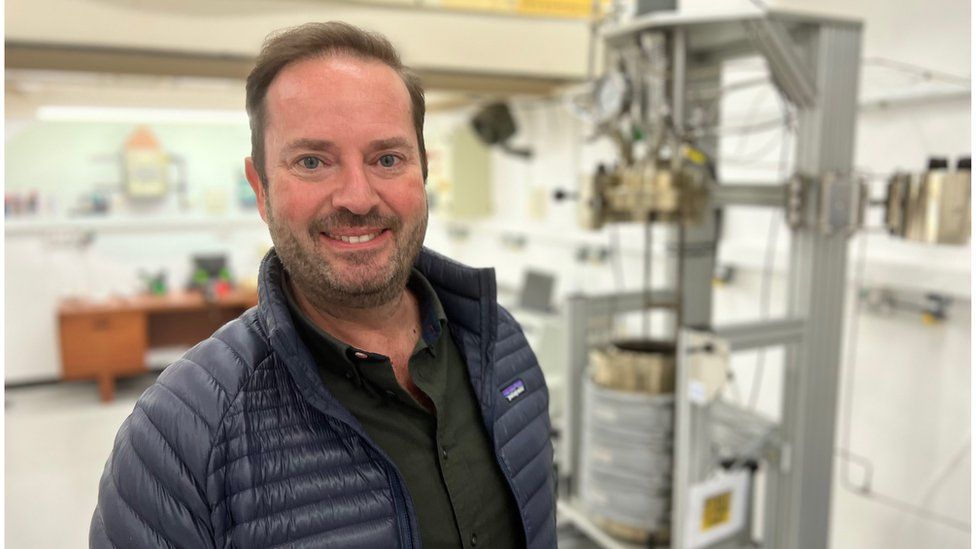 James Hygate, of Firefly, standing in his laboratory