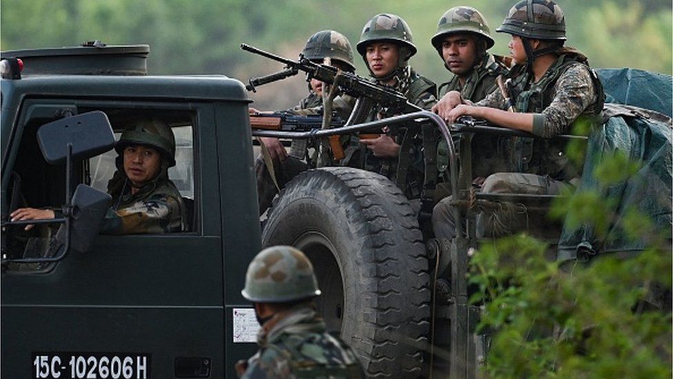Indian Army soldiers patrol during a rescue operation following ethnic violence in the region, near Imphal, northeastern Indian state of Manipur on May 7, 2023
