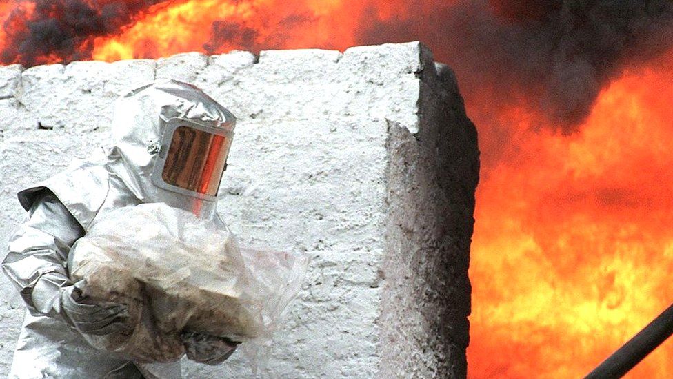 Man burning cocaine in Lima, Peru