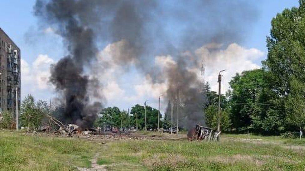 Smoke billows from a car   damaged during a Russian onslaught   connected  a residential gathering  adjacent   eastbound   Kharkiv, July 4, 2023