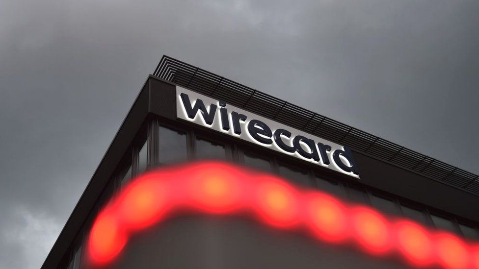 The logo of German payments provider Wirecard is seen at a building of the company's headquarters in Aschheim near Munich, southern Germany, on September 2, 2020