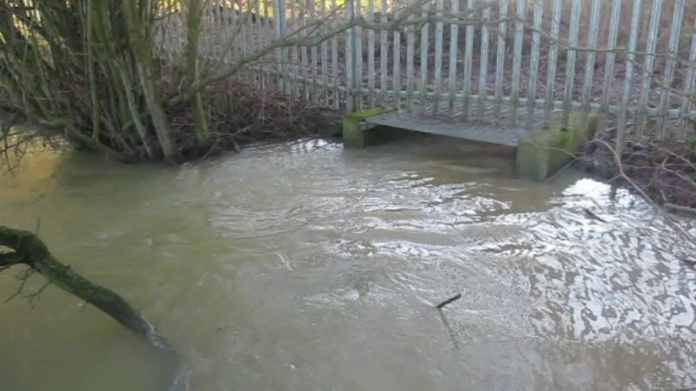 Sewage pouring from Witney treatment works overflow into Colwell Brook