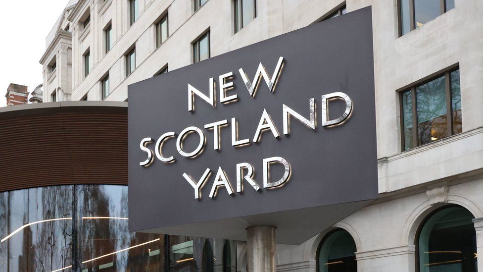 A file photo showing the sign outside the headquarters of the Metropolitan Police force which reads: "New Scotland Yard".