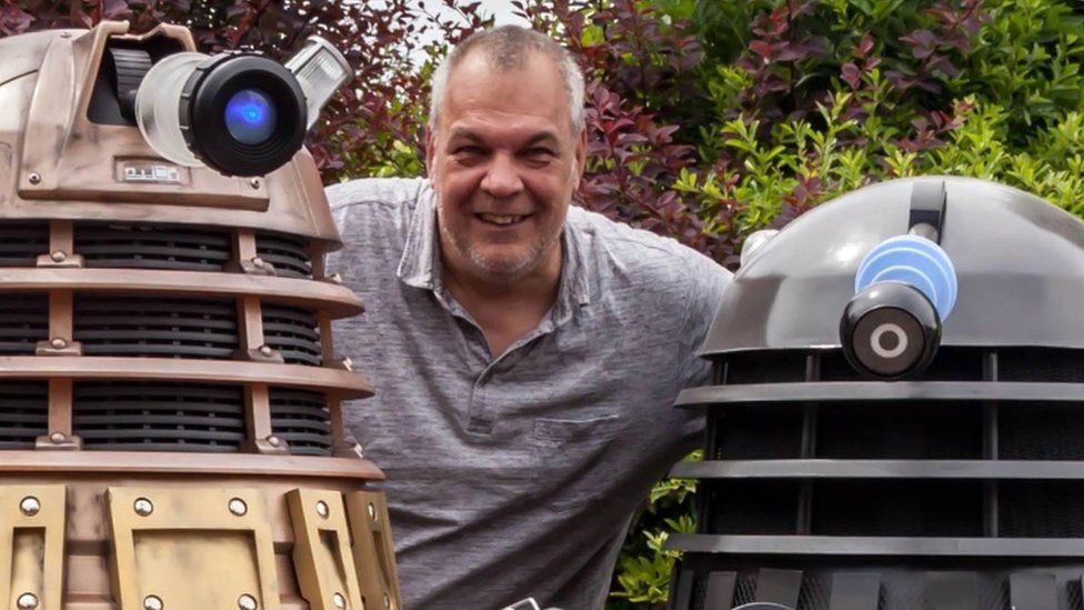 Kev Handley with his two handmade Daleks