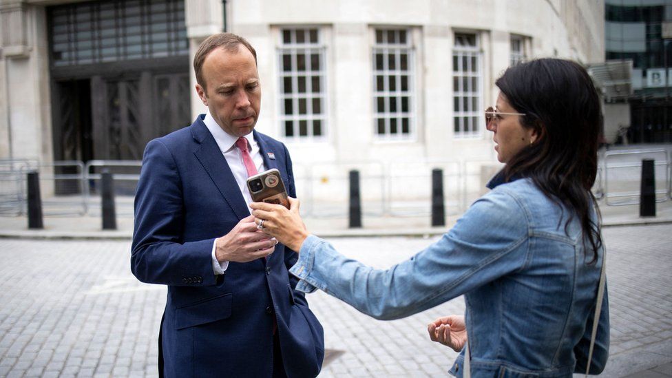 Gina Coladangelo shows Matt Hancock a phone