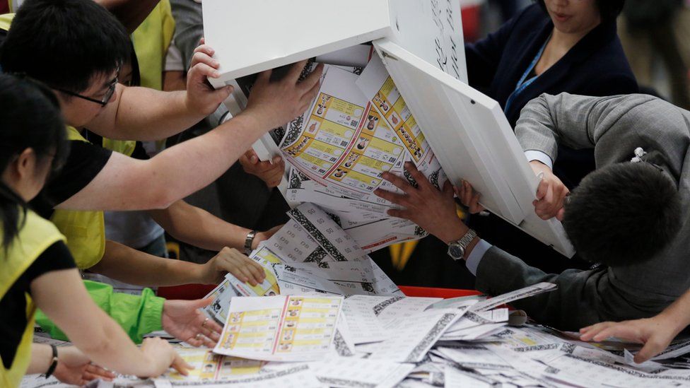 Electoral officers count ballots for the LegCO elections in Hong Kong (5 September 2016)