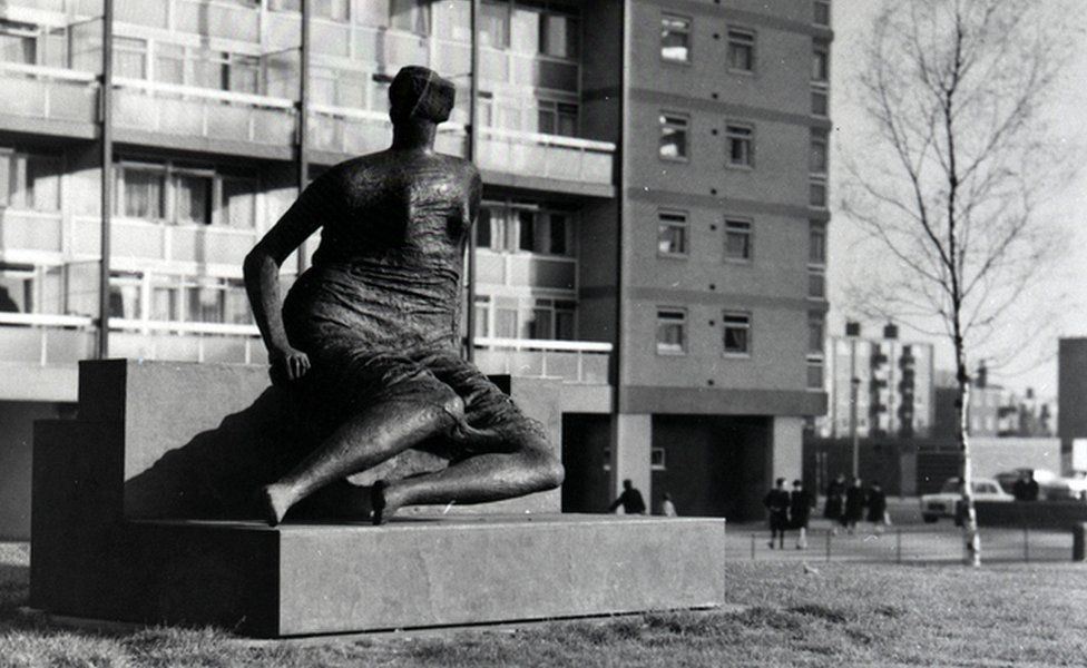 Henry Moore's sculpture Draped Seated Woman in its original position in Stifford Estate