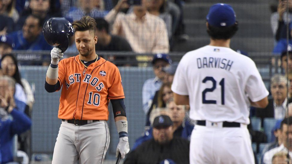 Houston Astros' Yuli Gurriel tipped his helmat at Dodgers pitcher Yu Darvish