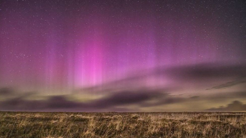 Northern Lights glowing pink over Exmoor from a point near Lucott Cross, Exmoor National Park