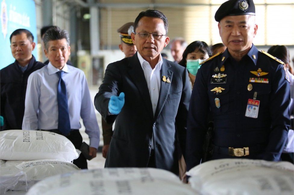 A handout photo made available by the Office of Narcotics Control Board (ONCB) shows Thai Justice Minister Somsak Thepsutin (C) and the secretary-general of the ONCB, Wichai Chaimongkhon (R) inspect after seized Ketamine inside a warehouse at Bang Pakong District in in Chachoengsao province, Thailand, 12 November 2020.