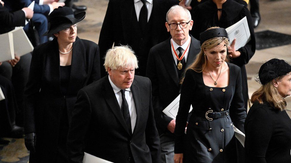Boris Johnson and Carrie Johnson arrive at the Queen's funeral