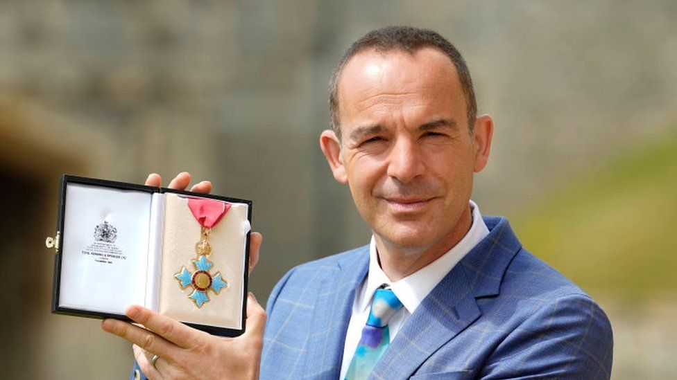 Martin Lewis receives a CBE last year for services to broadcasting and consumer rights