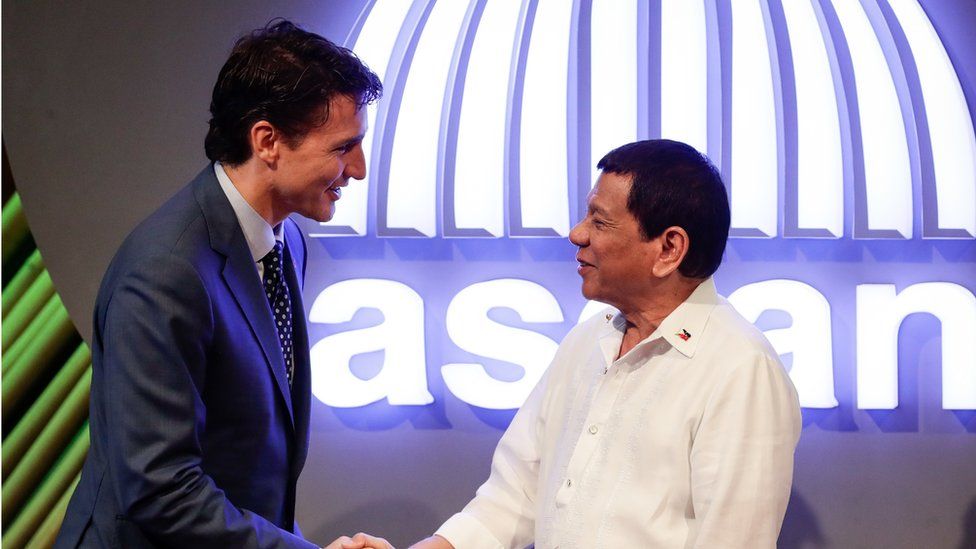 Canadian Prime Minister Justin Trudeau greets Philippines President Rodridgo Duterte