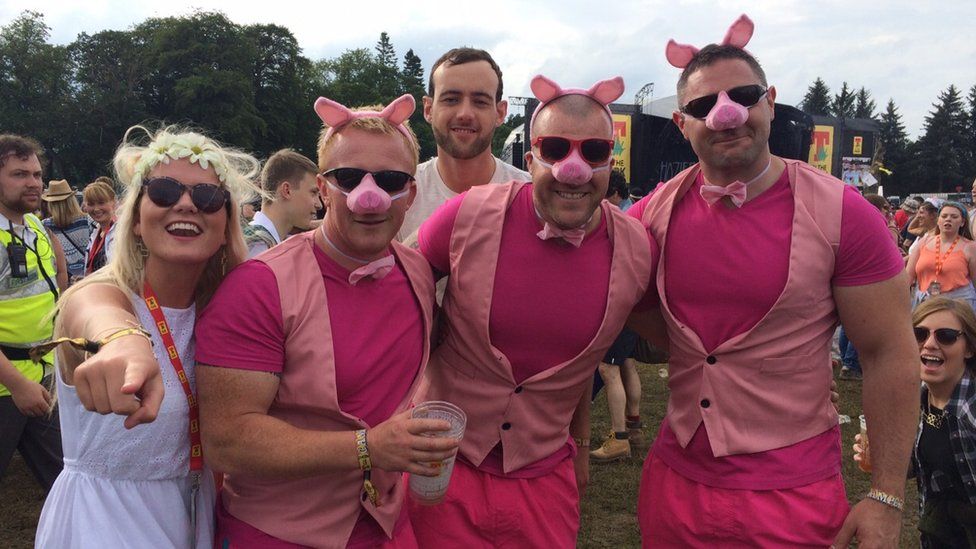 friends dressed as pigs at t in the park