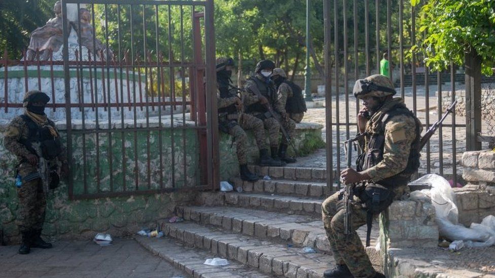 Troops guard the residence where President Moise was shot
