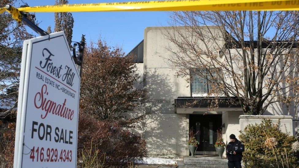 Police work at the home of Barry and Honey Sherman in Toronto