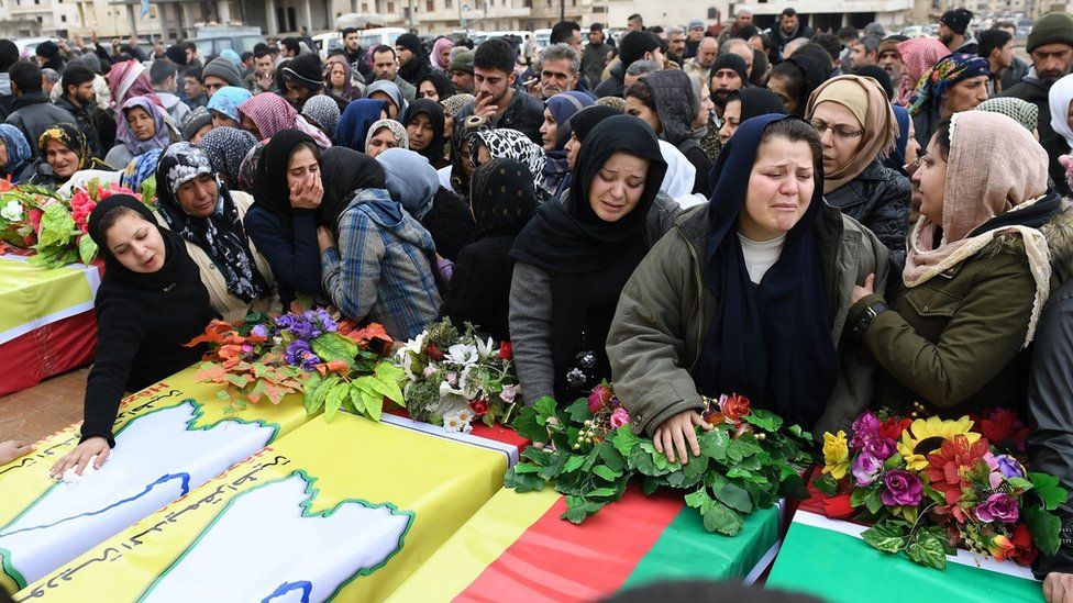Syrian women mourn at the funeral in Afrin city of several civilians and fighters killed during the Turkish offensive on the Kurdish enclave on Afrin (25 January 2018)
