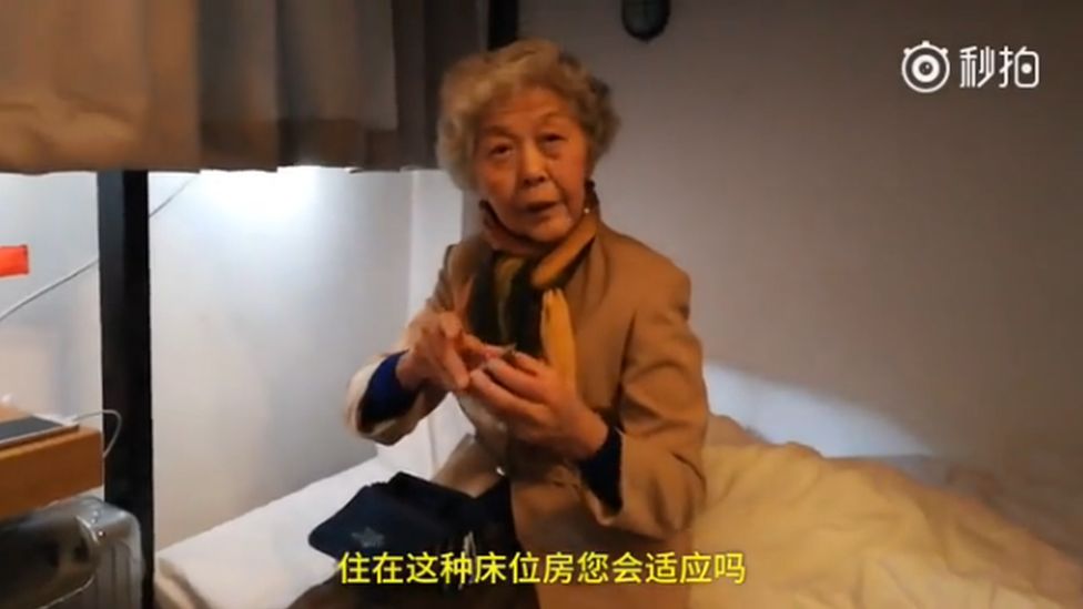 Ms Qi in a dormitory