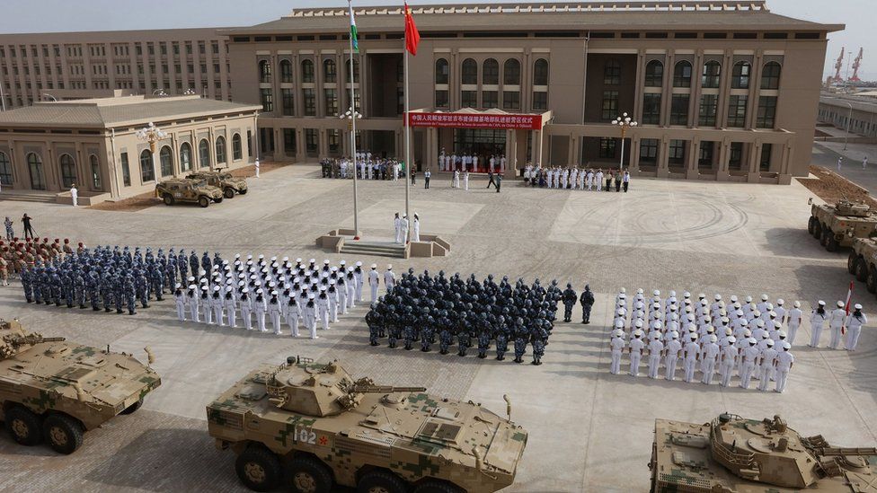 Chinese People's Liberation Army staff attend the opening ceremony of China's new military base in Djibouti. China has deployed troops to its first overseas naval base in Djibouti.