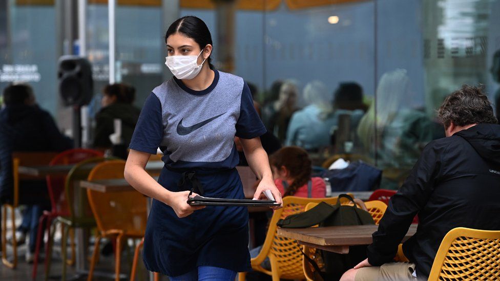 Archive image of a waitress in London