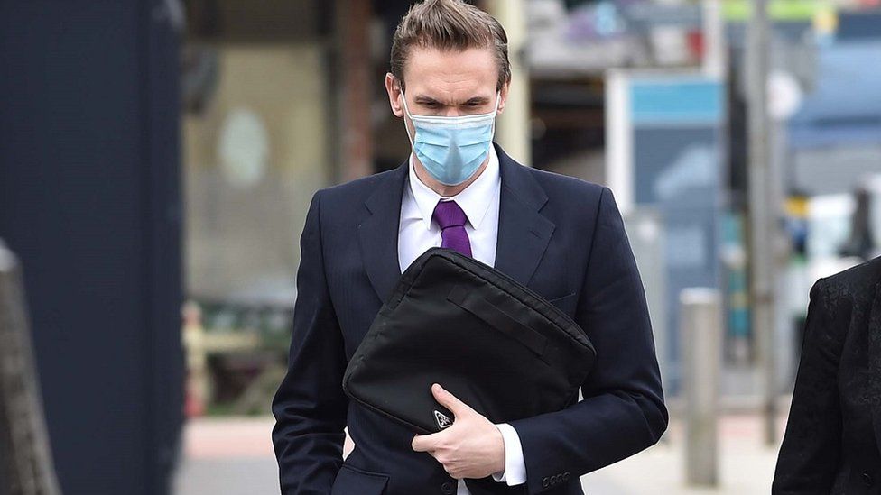 Dr Jessen masked arriving at court