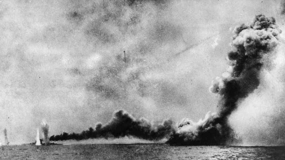 This picture shows the HMS Lion (left) is shelled and HMS Queen Mary, (right) is blown up by German shells during the Battle of Jutland