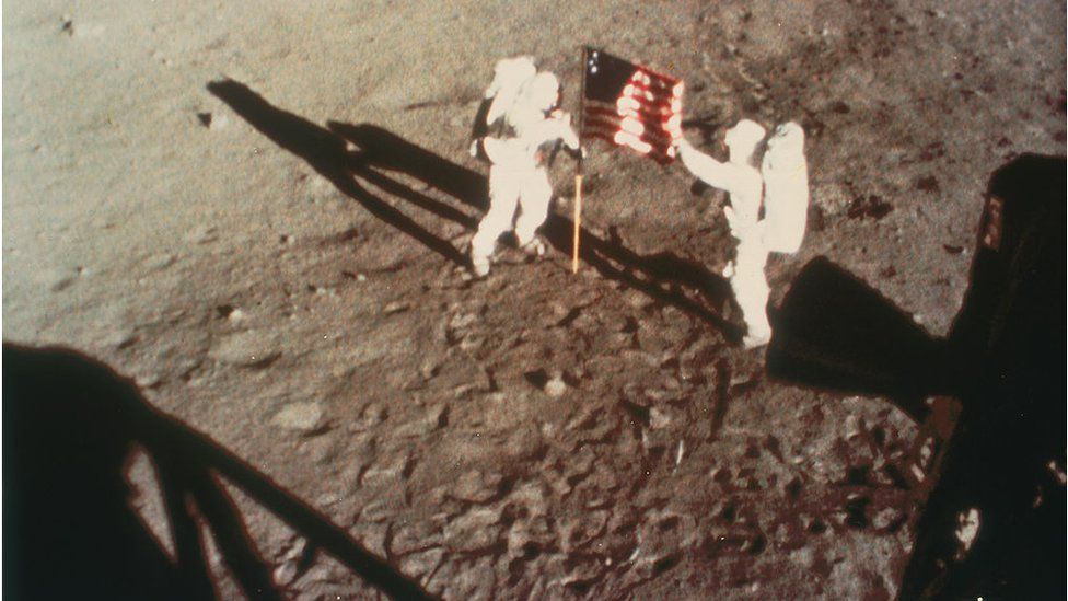 Armstrong and Aldrin unfurl the US flag on the moon, 1969