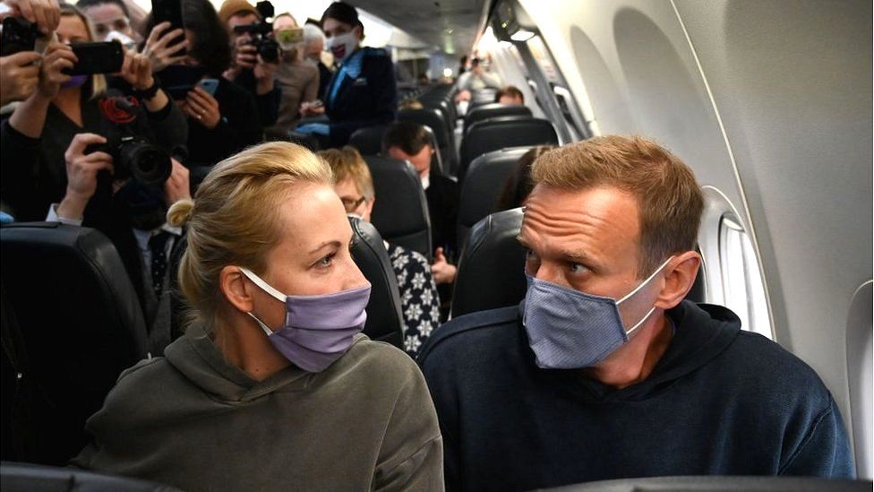Russian opposition leader Alexei Navalny and his wife Yulia on board a flight from Berlin to Moscow, 17 January 2021