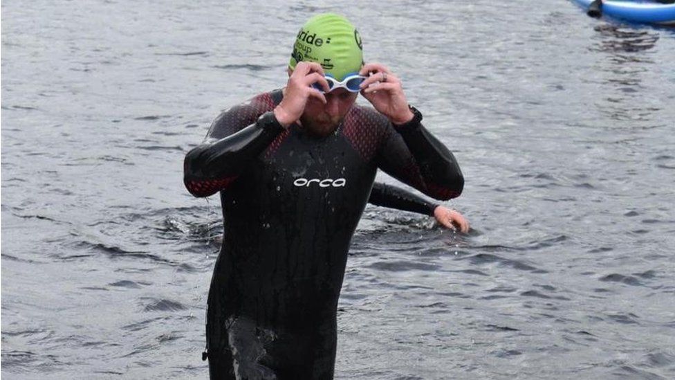 John McDermott swimming in triathlon