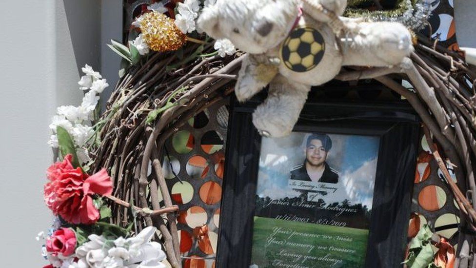 A wreath and photo honours 15-year-old victim Javier Amir Rodriguez, who was killed in the El Paso shooting