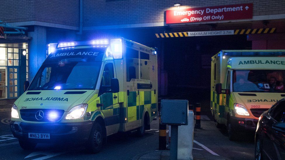 A ambulance leaves the Accident and Emergency department of the Bristol Royal Infirmary