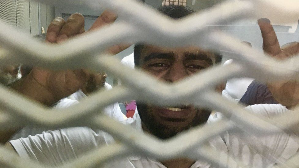Ibrahim Halawa celebrates his acquittal, Egypt court, 18 September 2017