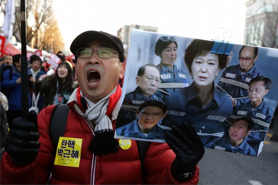 A protester shouts slogans against South Korean President Park Geun-Hye on December 10, 2016 in Seoul, South Korea.
