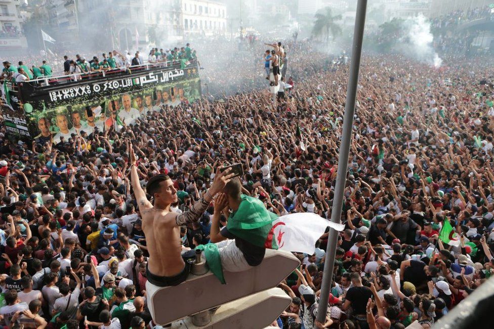 Tens of thousands Algerian fans welcome the players of Algeria national football team at Houari Boumediene Airport, in Algiers, Algeria - 20 July 2019