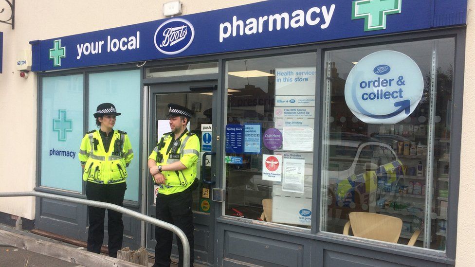 Police outside Boots in Amesbury