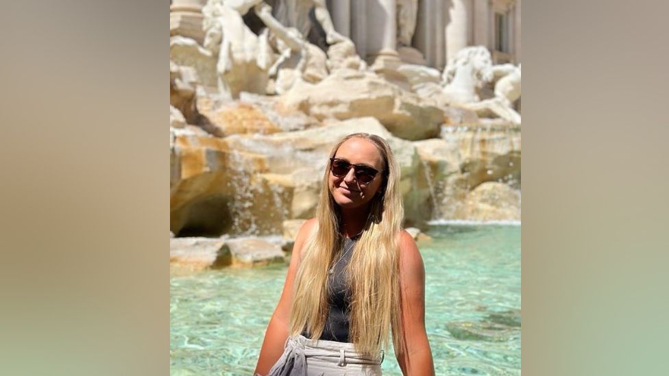 Amy Taylor in front of the Trevi Fountain in Rome