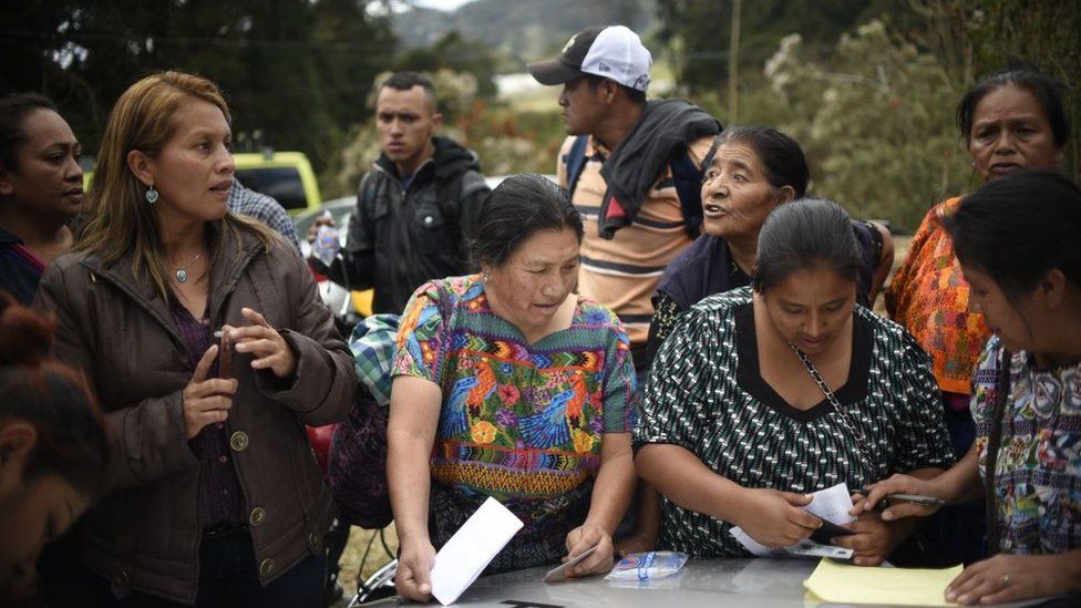 Relatives wait outside the children's shelter Virgen de la Asuncion after a fire at the facility in San Jose Pinula, about 30km east of Guatemala City, on March 8, 2017.