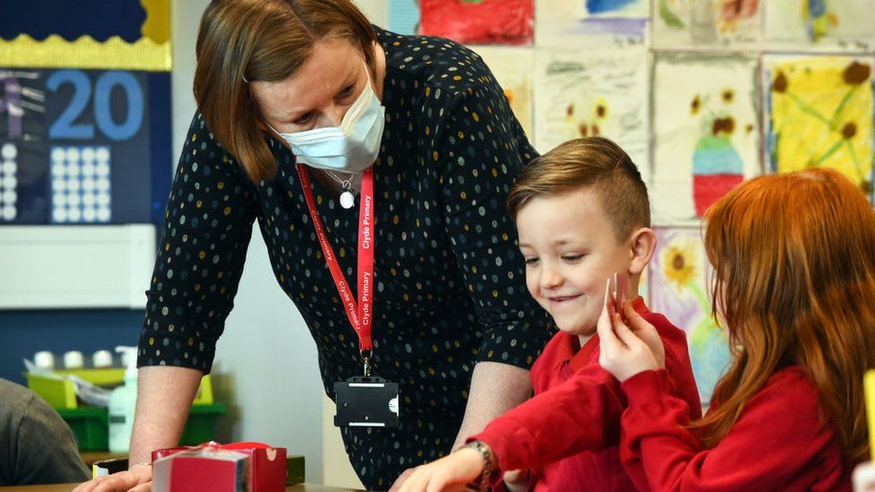 Pupils take part in a class at Clyde Primary School in Glasgow on February 22, 2021