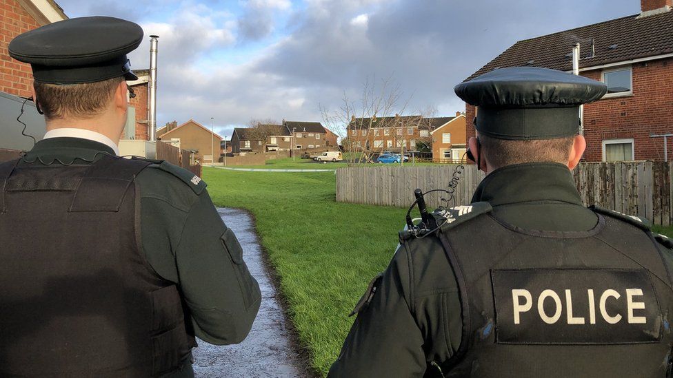 Police officers at the scene of a security alert in the Galliagh area of Londonderry