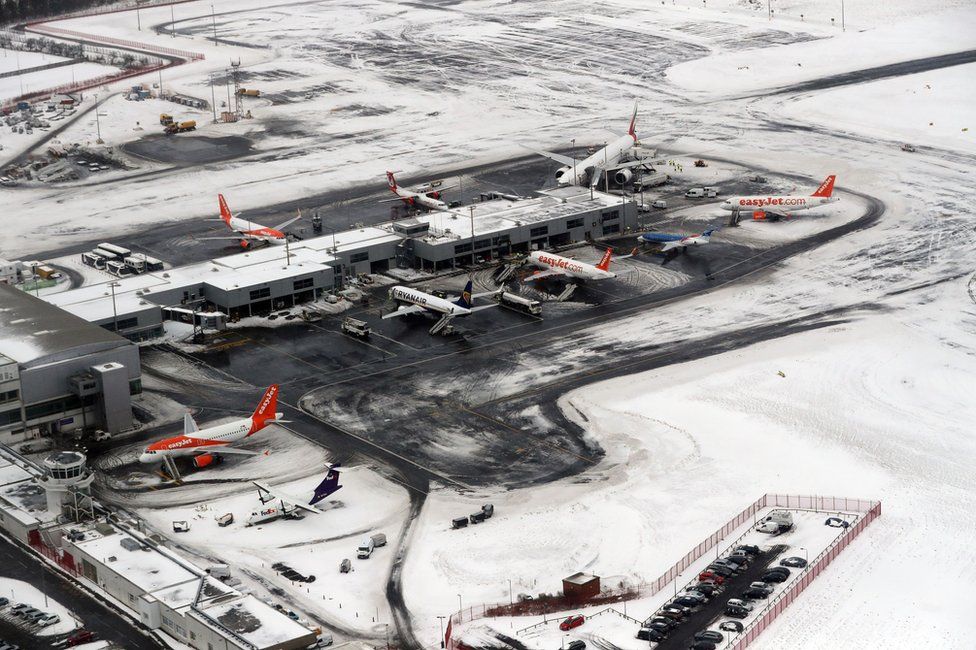 Aerial view of a snow covered Newcastle Airport