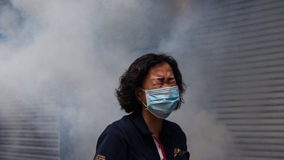 Tear gas is fired to disperse a protest in Hong Kong in May