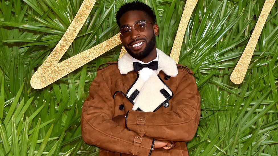 Tinie Tempah Styles With Coach Jacket, Sneakers, and Bag at London Men's  Fashion Week