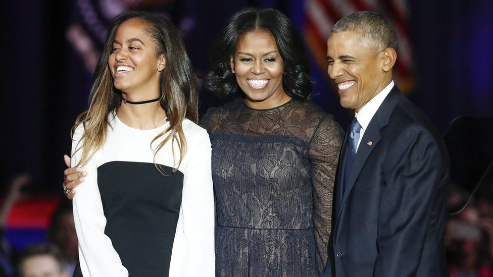 Malia, Michelle and Barack Obama