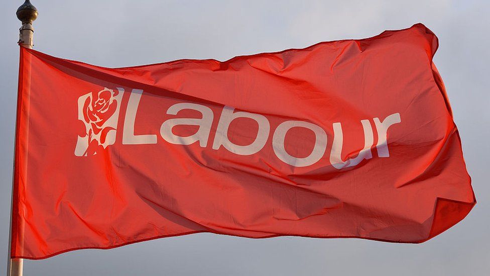The Labour flag flies outside the Brighton Center ahead of the Labour Party Autumn Conference