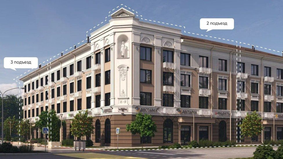 A website screenshot shows Zhiloy Dom na Nakhimova - a private flat complex that will replace a war-damaged block of flats in the occupied city of Mariupol, Ukraine.