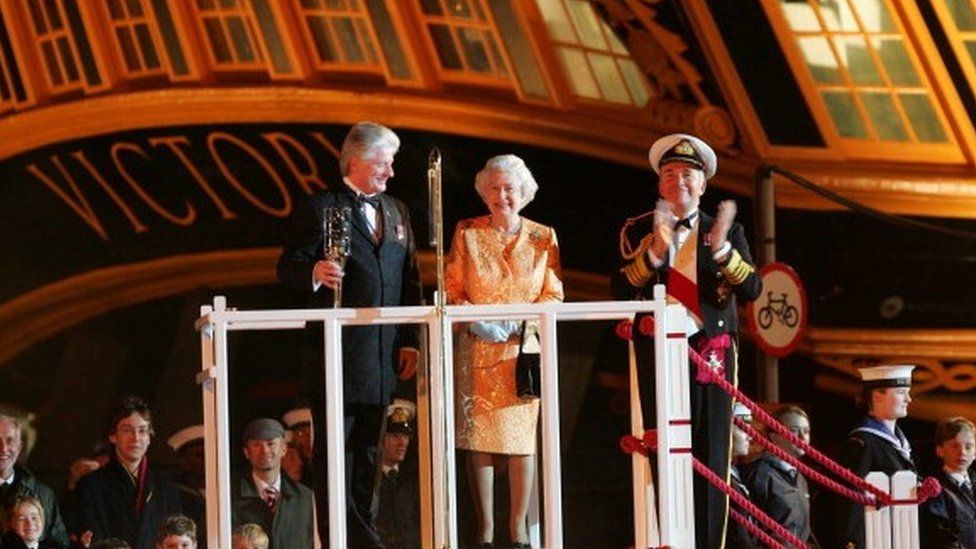 Queen Elizabeth II with HMS Victory