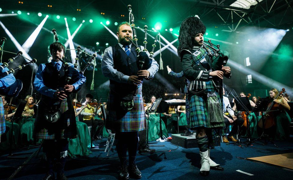 Bagpipe players performing with the Cross-Border Orchestra of Ireland